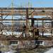 Kyle Young and Dan Haydon prepare a section of the barn structure as they carefully take apart a historic barn at Zingerman's Cornman Farms in Dexter on Monday, March 4, 2013. Melanie Maxwell I AnnArbor.com